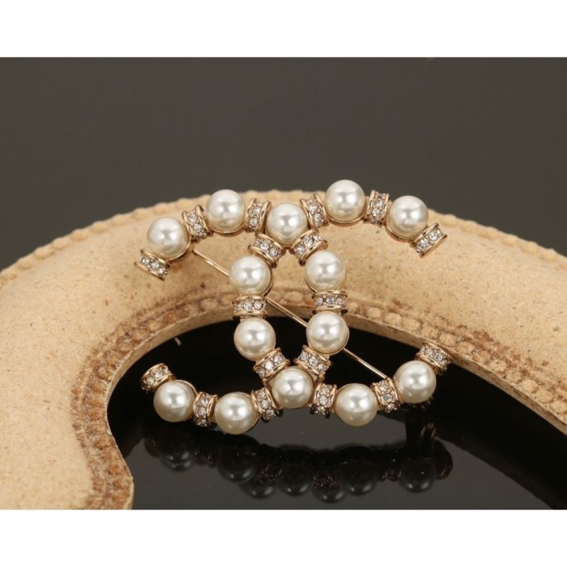 Ch*el brooches